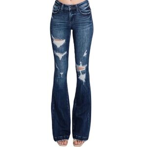 Distressed Mid Rise Stretch Flare Jeans